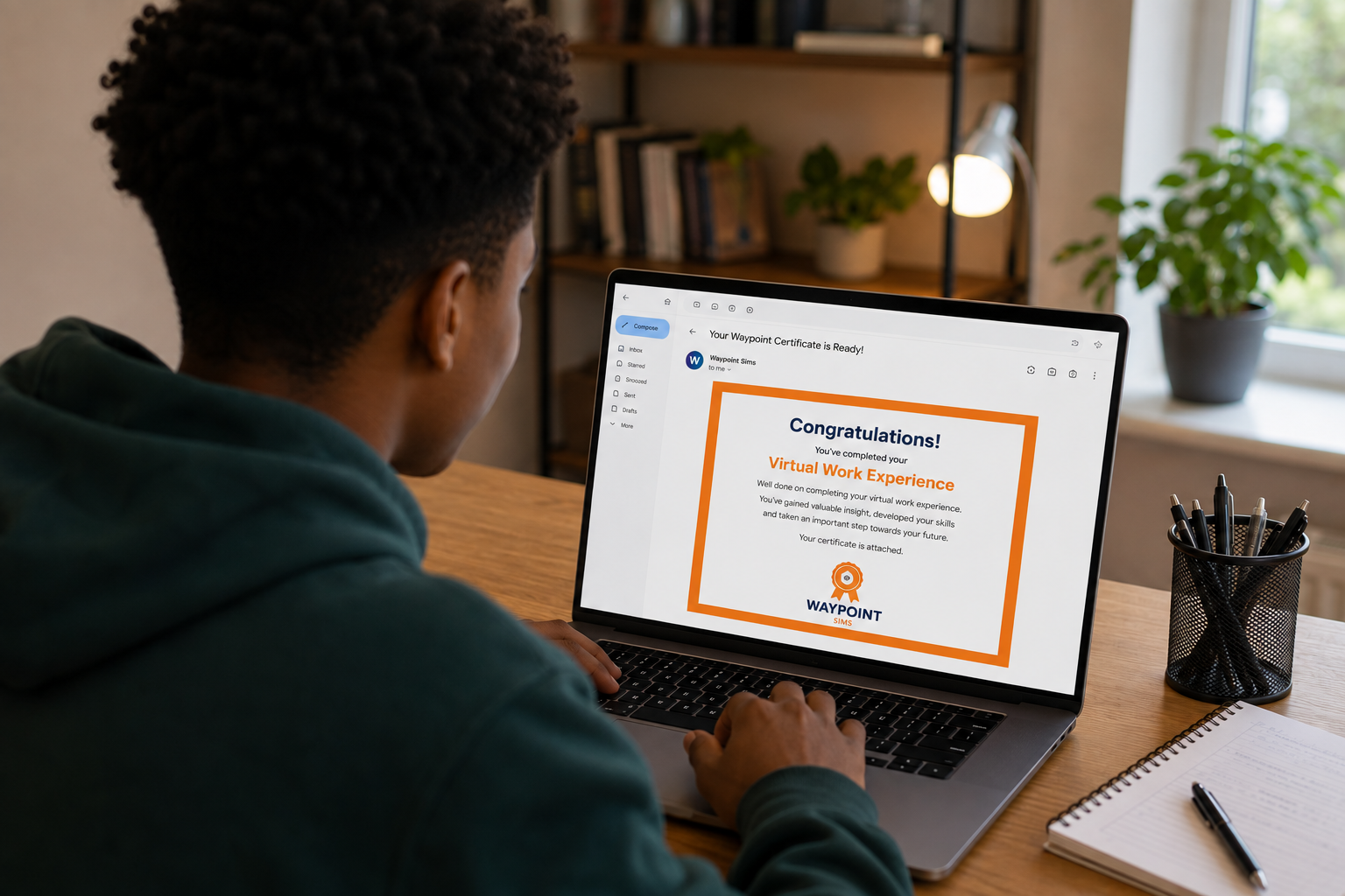 Young person viewing their virtual work experience completion certificate on a laptop.